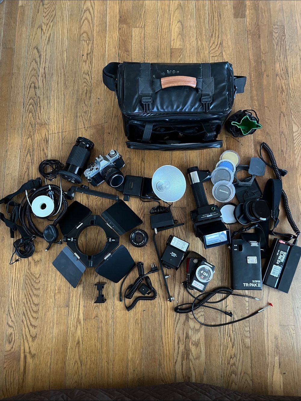 Canon Black Camera Bag with Assorted Photo Accessories